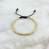 Pulsera Negra Cilindrica 2.8gr / 2mm Diamantada 32 und Oro Amarillo ©