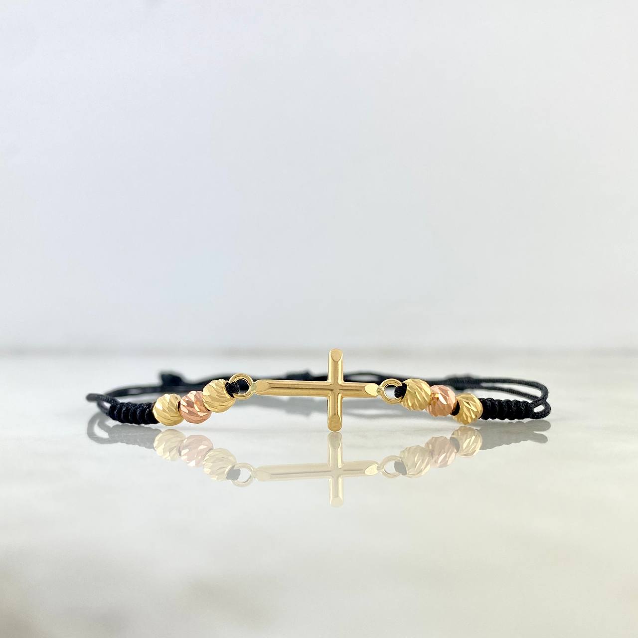 Pulsera Negra Cruz Troquelada Mini 1.35gr / 4mm Bolas Diamantadas 6 und Dos Oros Amarillo Rosa *