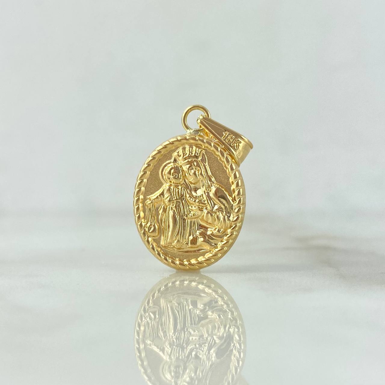 Dije Virgen del Carmen Bordeada 1.6gr / 3cm / Troquelada Oro Amarillo ©