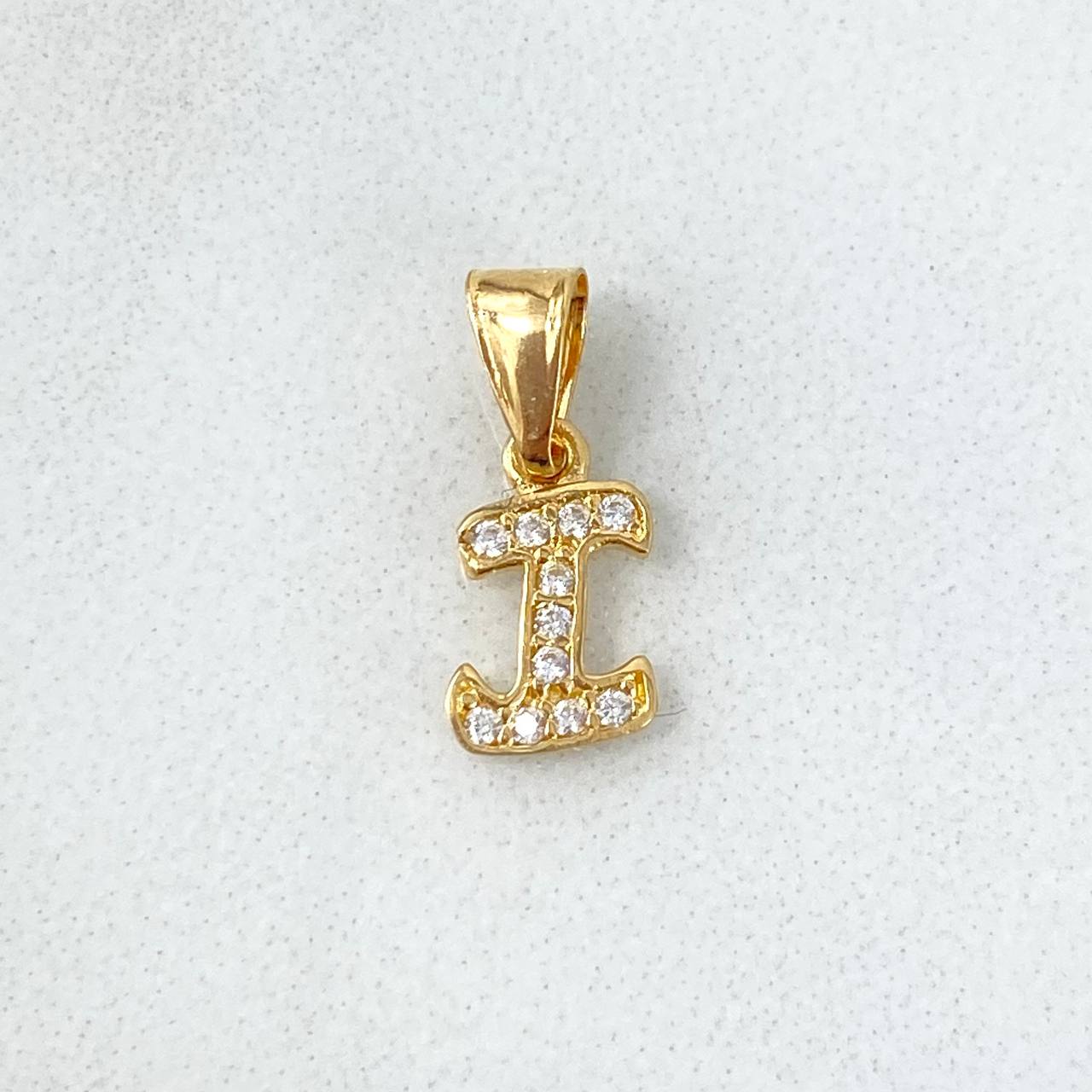 Dije Letra I Silueta 0.35gr / 1.3cm / Circones Blancos Oro Amarillo