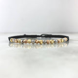 Pulsera Negra Lineal 2.5gr / 4mm Bolas Diamantadas 18 Und Tres Oros *