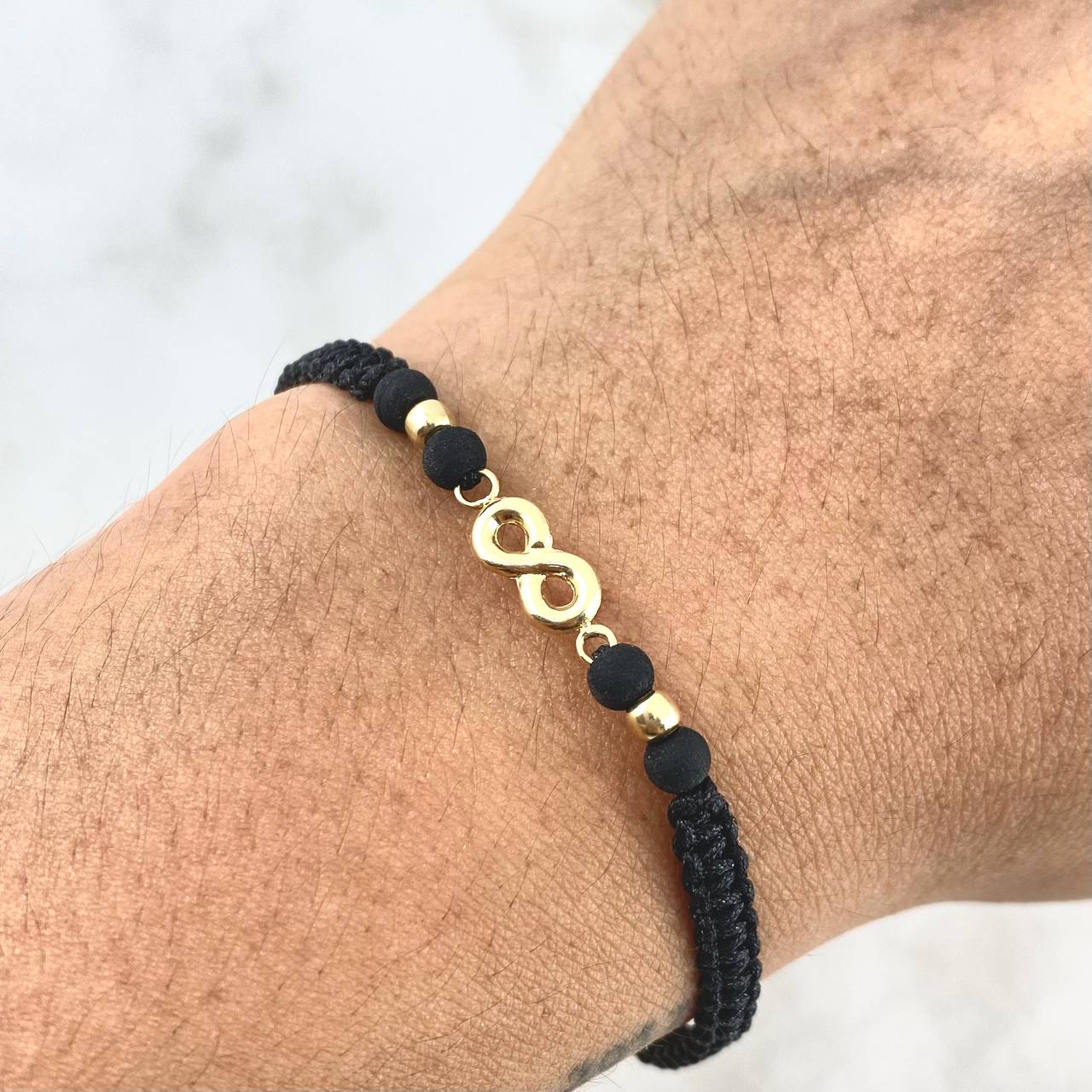 Pulsera Negra Infinito 0.45gr / 3mm Bolas Lisas 2 Und Oro Amarillo ©