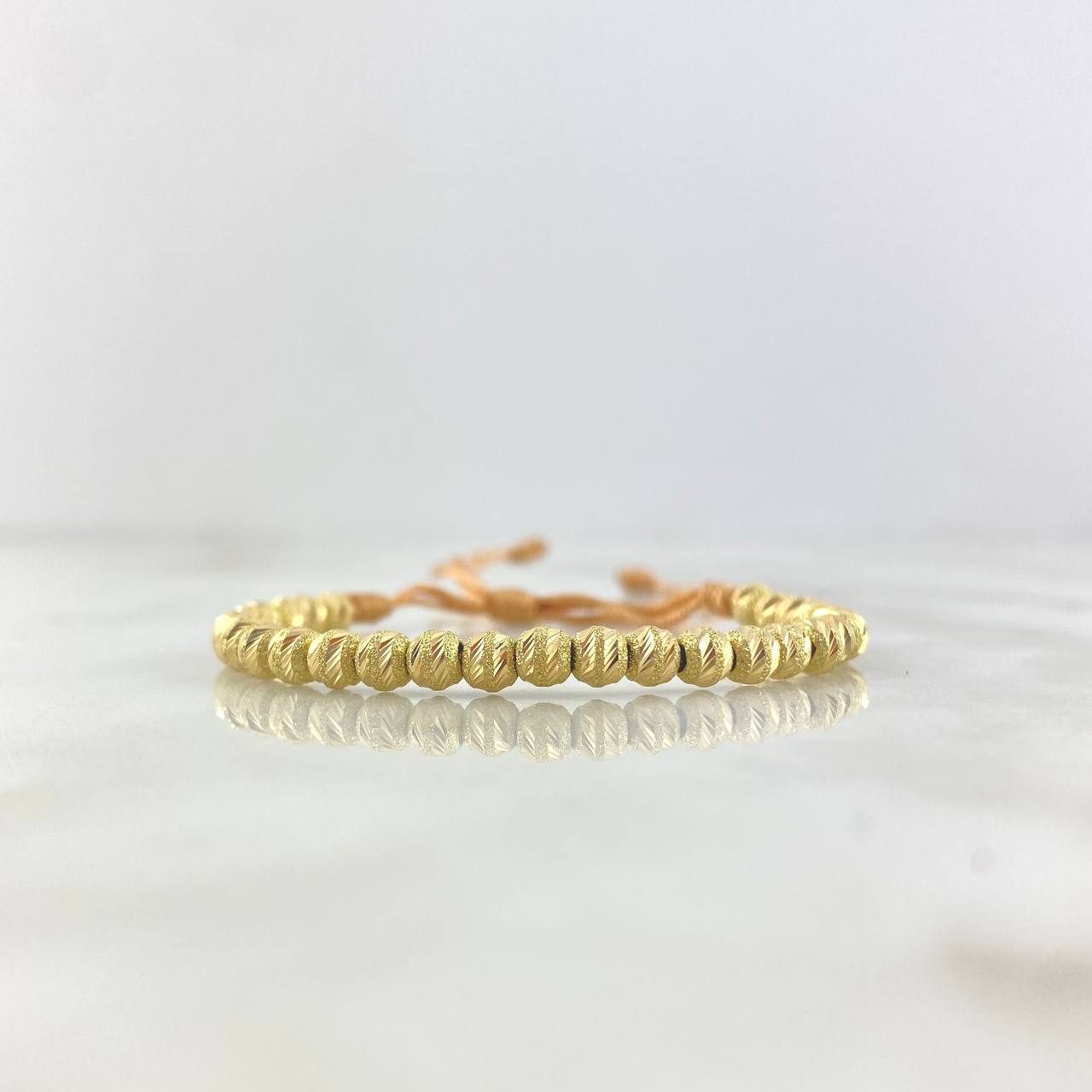 Pulsera Caqui Lineal 4gr / 4mm Bolas Satinadas 28 Und Oro Amarillo *