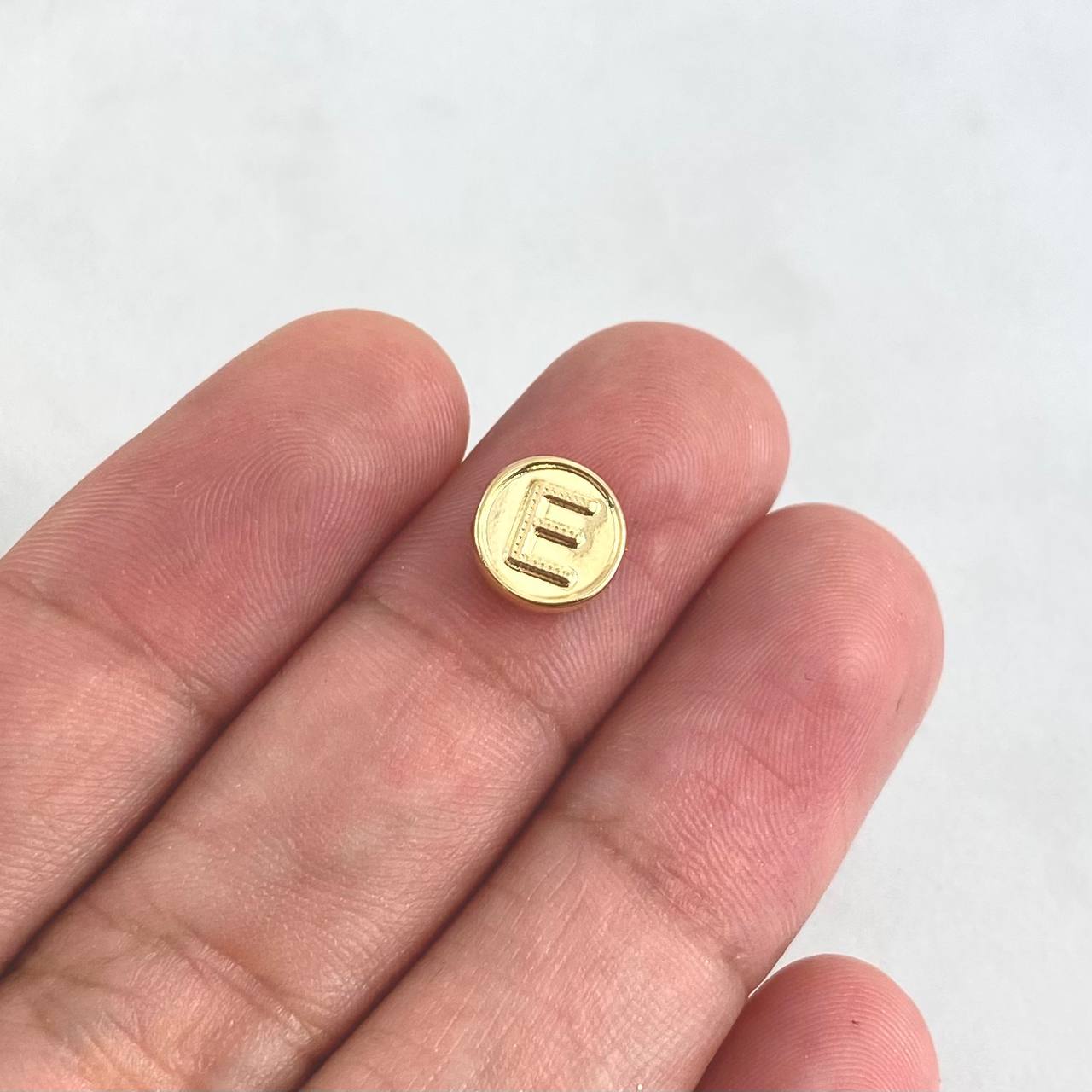 Herraje Letra E Tambor 0.25gr / 0.8cm / Doble Faz Oro Amarillo