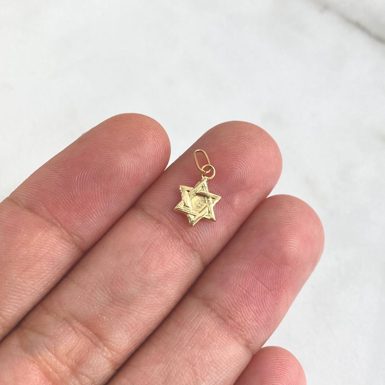 Dije Estrella De David 0.25gr / 1.5cm / Oro Amarillo 18K