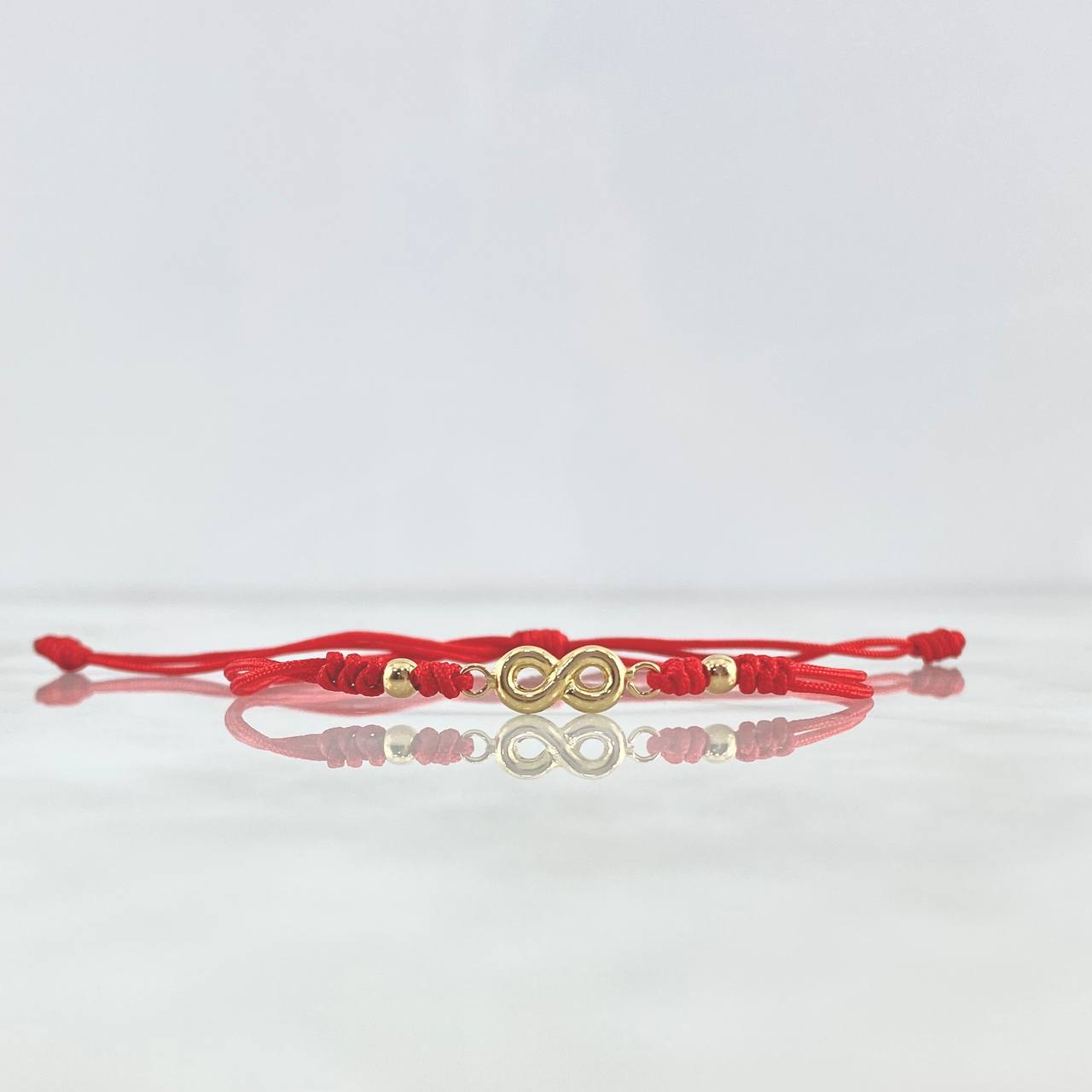 Pulsera Roja Infinito 0.4gr / 3mm Bolas Lisas 2 Und Oro Amarillo