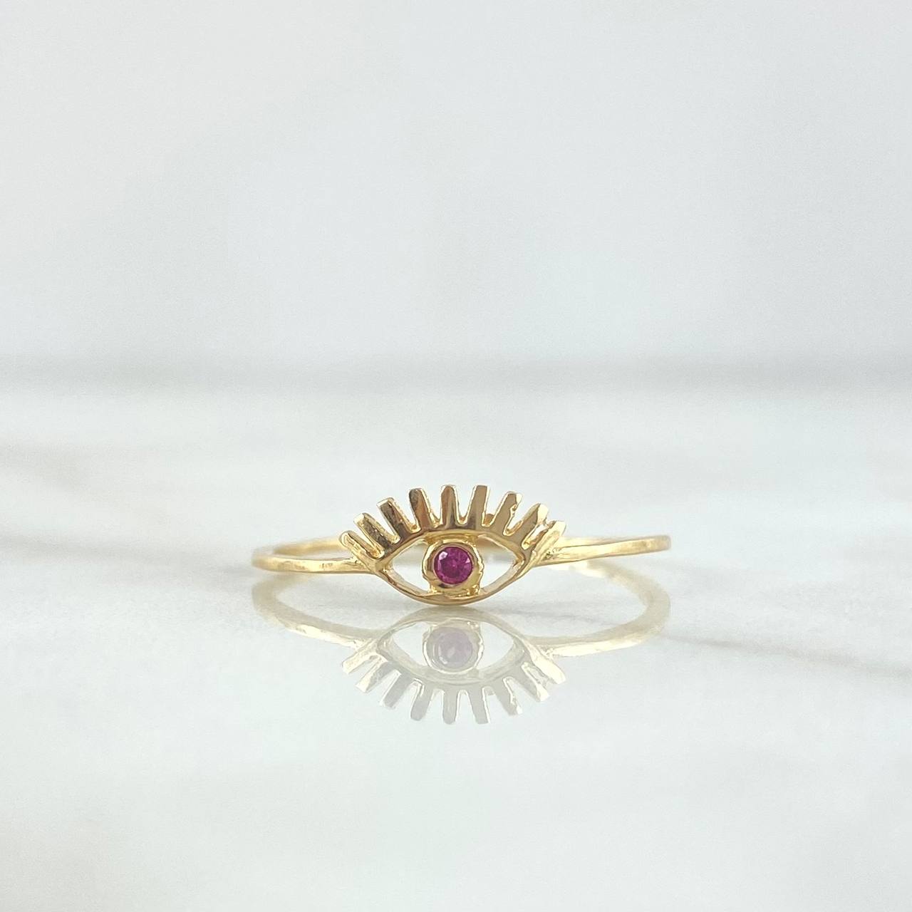 Anillo Ojo Turco 0.7gr / T5 1/2 / Circon Fucsia Oro Amarillo