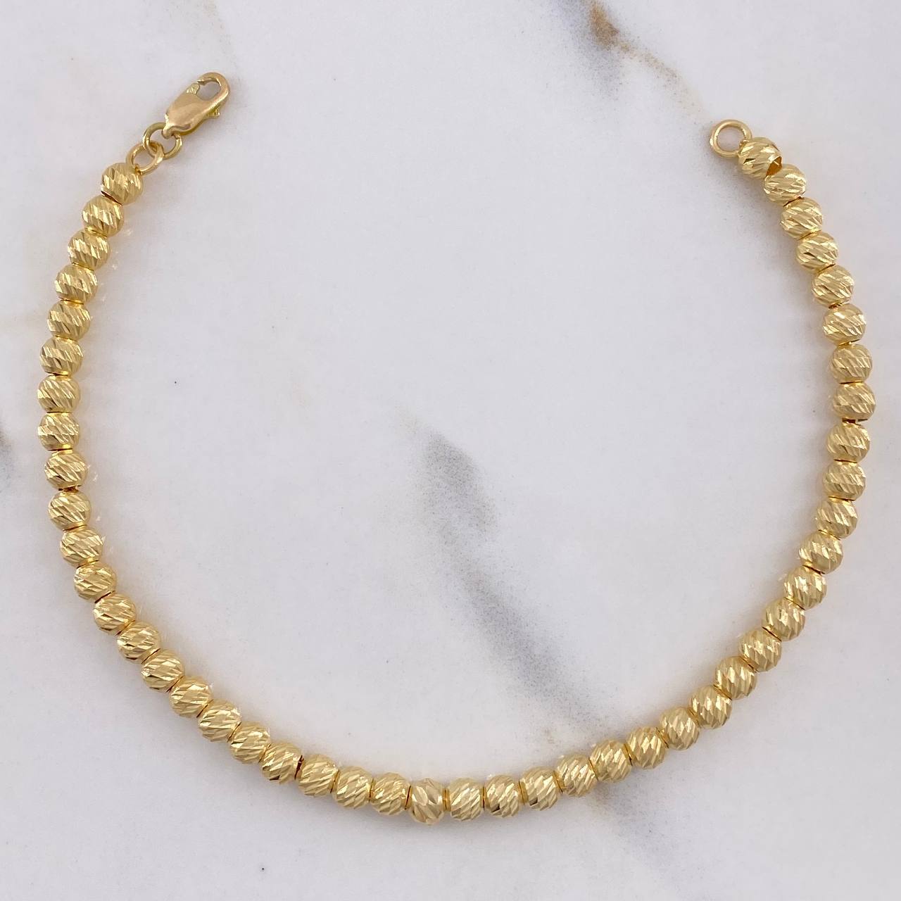 Pulso Militar 4.6gr / 18cm / 4mm Bolas Diamantadas Oro Amarillo $