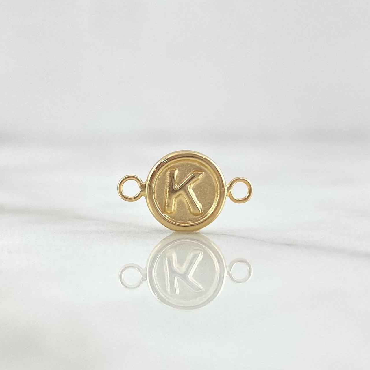 Herraje Letra K 0.4gr / 1.3cm / Circulo Mate Oro Amarillo 18K