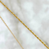 Set Cadena Lazo 1gr / 50cm / 1.2mm + Dije Virgen Milagrosa 0.45gr / 1.7cm / Cargador Bordeado Oro Amarillo 18K (Oferta)