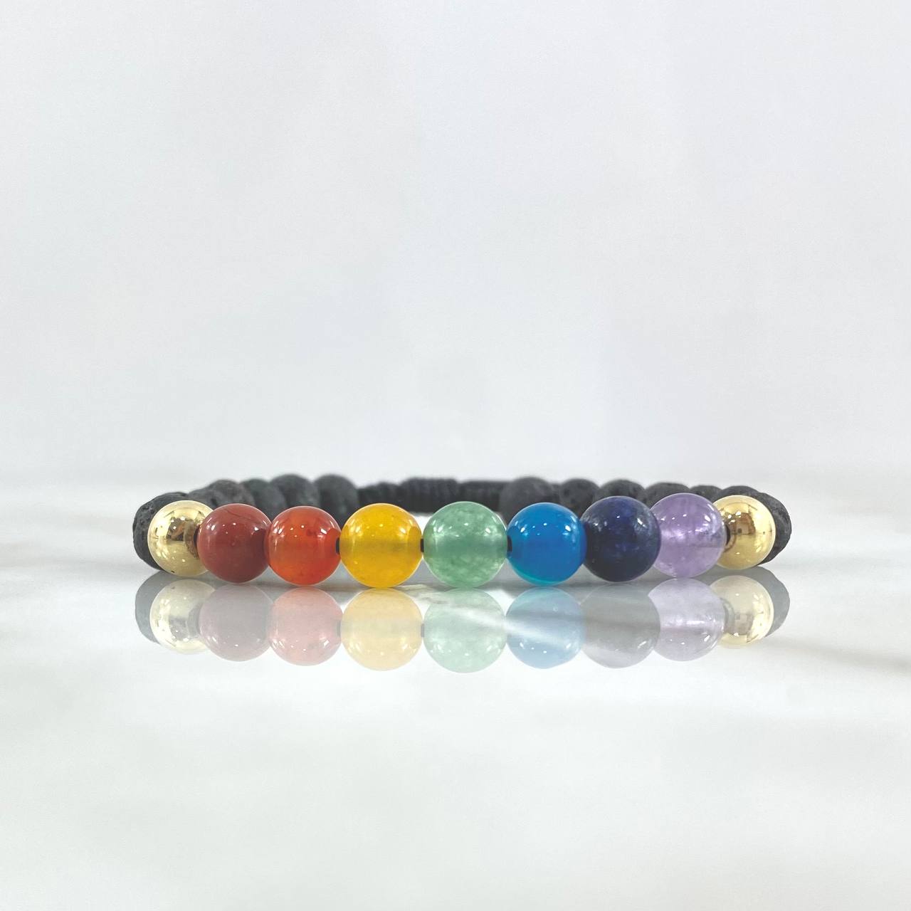 Pulsera Negra Siete Chakras 0.4gr / 6mm Bolas Lisas 2 und Piedras Volcanicas Oro Amarillo 18K ©