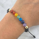 Pulsera Negra Siete Chakras 0.4gr / 6mm Bolas Lisas 2 und Piedras Volcanicas Oro Amarillo 18K ©