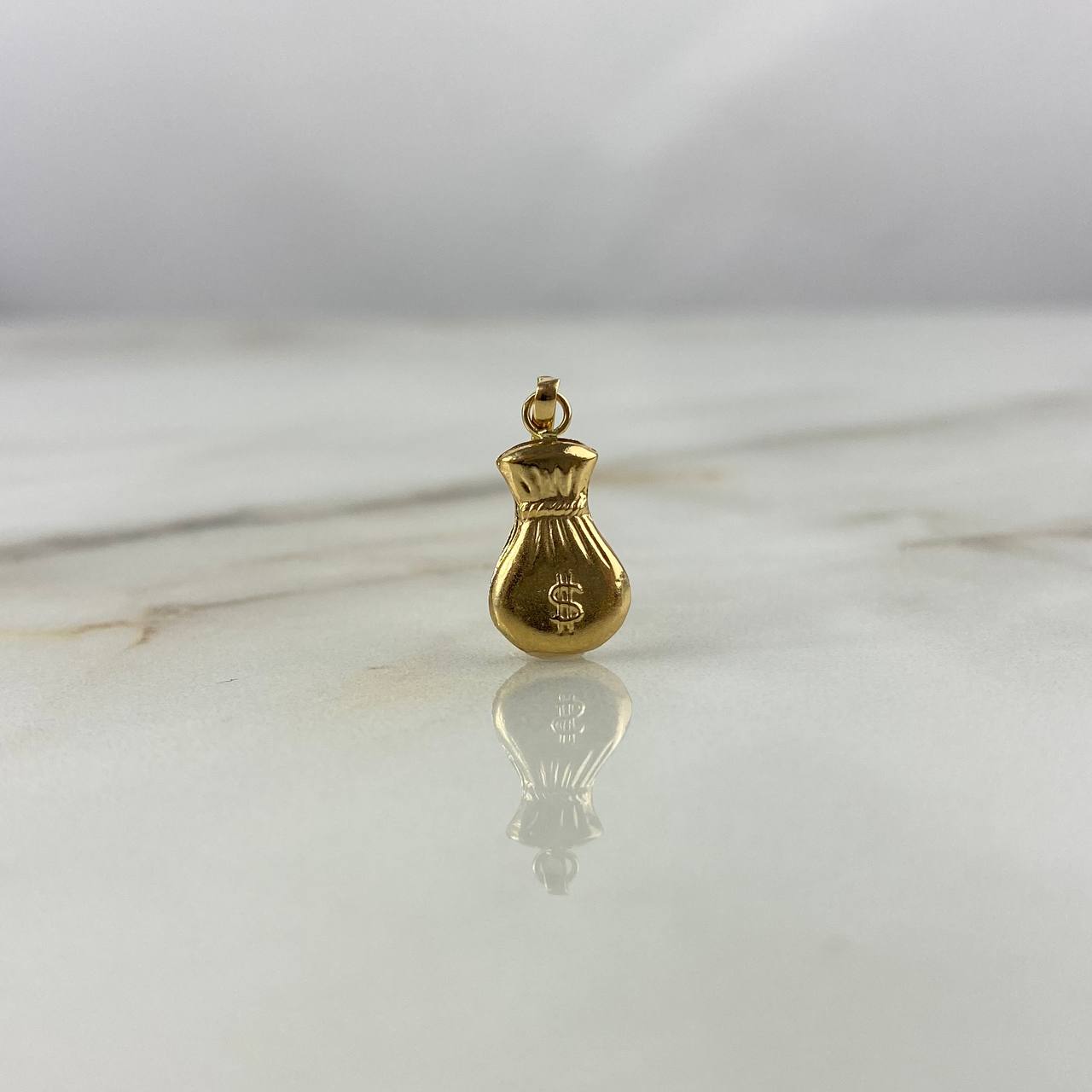 Dije Bolsa De Dinero 0.6gr / 2.2cm / Oro Amarillo