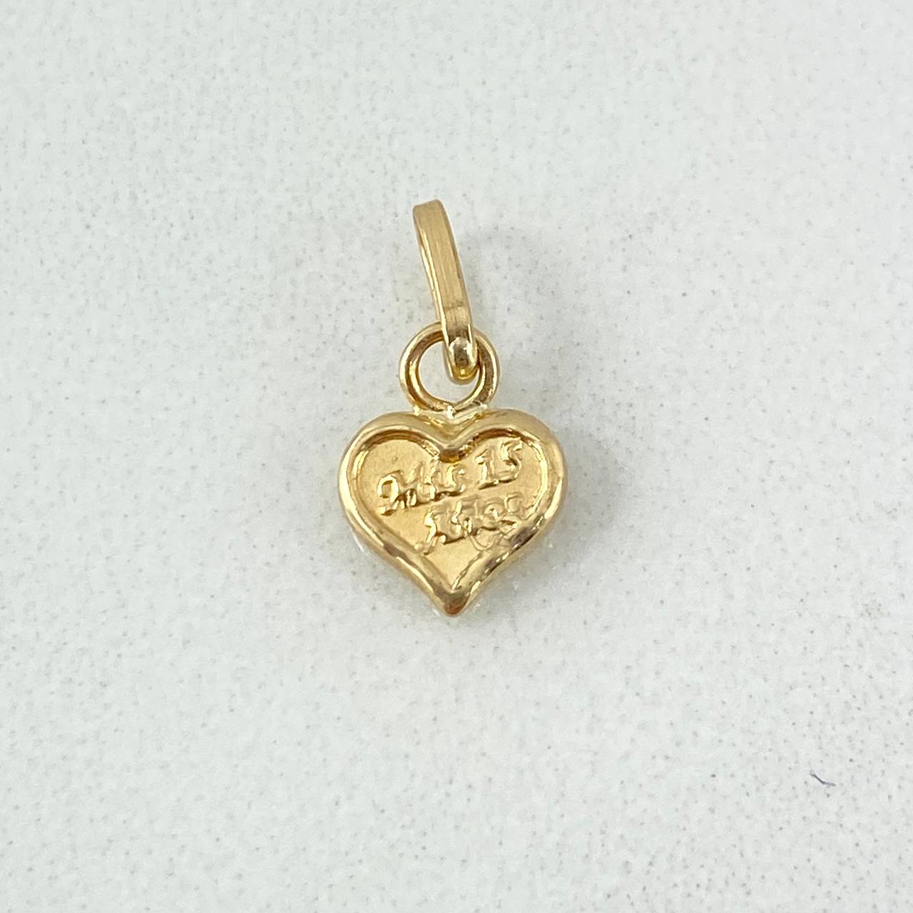 Dije Corazon 15s 0.35gr / 1.3cm / Oro Amarillo