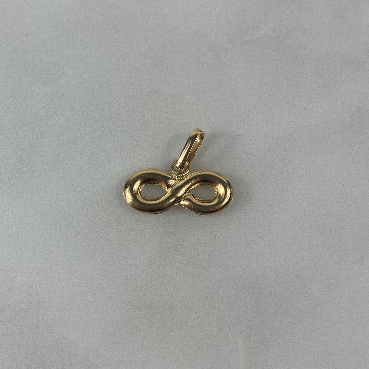 Dije Infinito  0.85gr / 1.5cm Troquelado Oro Amarillo