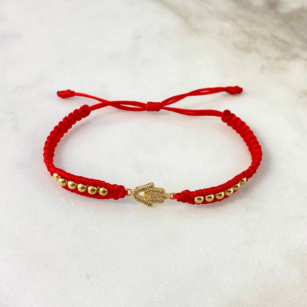 Pulsera Roja Hamsa Mini 1.25gr / 3mm Bolas Lisas 12 und Circones Blancos Oro Amarillo *