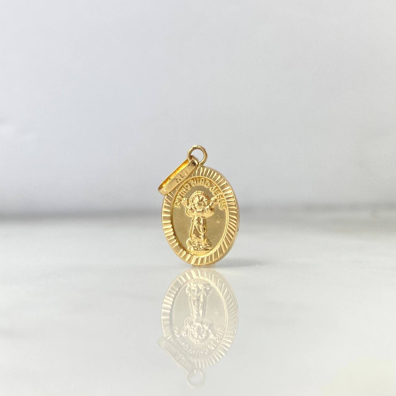 Dije Divino Niño 1.1gr / 2.4cm / Troquelado Oro Amarillo