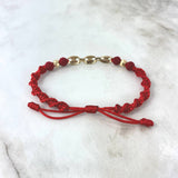 Pulsera Roja GC Espiral Rayada 2.25gr / 3.1cm / 5mm Bolas Diamantadas 2 und Circones Blancos Oro Amarillo *