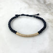 Pulsera Negra Cilindrica Rayada 2.95gr / 3.9cm / Circones Blancos Oro Amarillo *