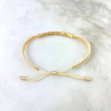 Pulsera Beige Cilindrica 2.95gr / 3.9cm / Circones Blancos Oro Amarillo *