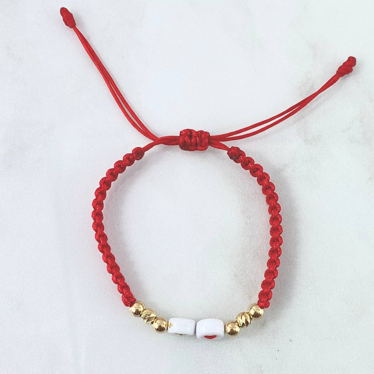 Pulsera Roja Letra T Corazon 0.65gr / 4mm Bolas Lisas Diamantadas 6 und Oro Amarillo *