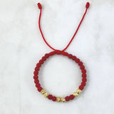 Pulsera Roja Neo Rayada 1.5gr / 5mm Bolas Satinadas 6 und Oro Amarillo *