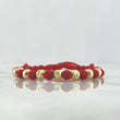 Pulsera Roja Neo Intersecta 1.6gr / 5mm Bolas Lisas Satinadas 9 und Oro Amarillo *