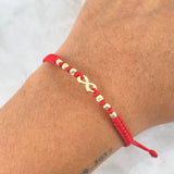 Pulsera Roja Infinito 0.8gr / 3mm Bolas Lisas Diamantadas 6 und Oro Amarillo ©