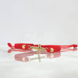 Pulsera Roja Cruz Plana 0.75gr / 4mm Bolas Diamantadas 2 und Oro Amarillo ©