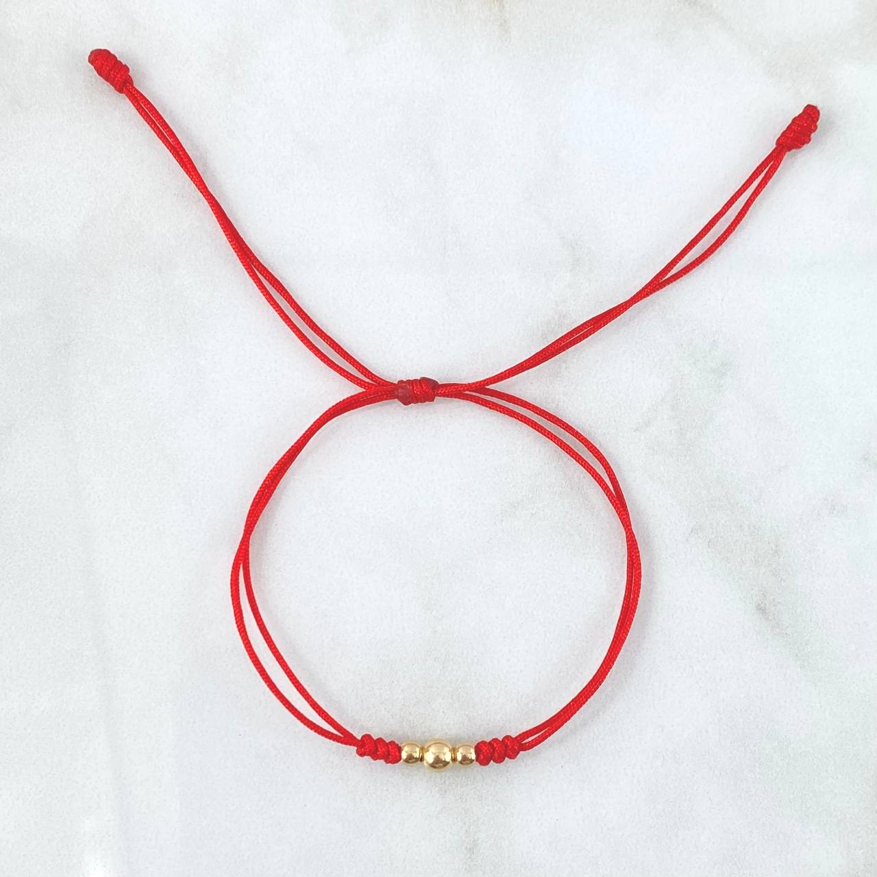 Pulsera Roja Trio Disimil 0.25gr / 4mm-3mm Bolas Lisas 3 und Oro Amarillo ©