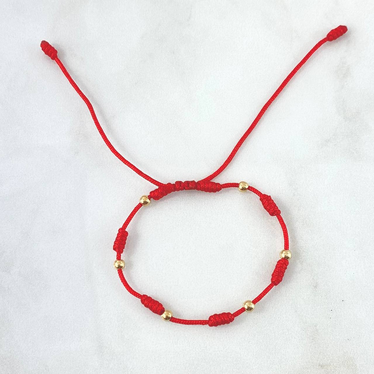 Pulsera Roja Seis Caminos 0.35gr / 3mm Bolas Lisas 6 und Oro Amarillo ©