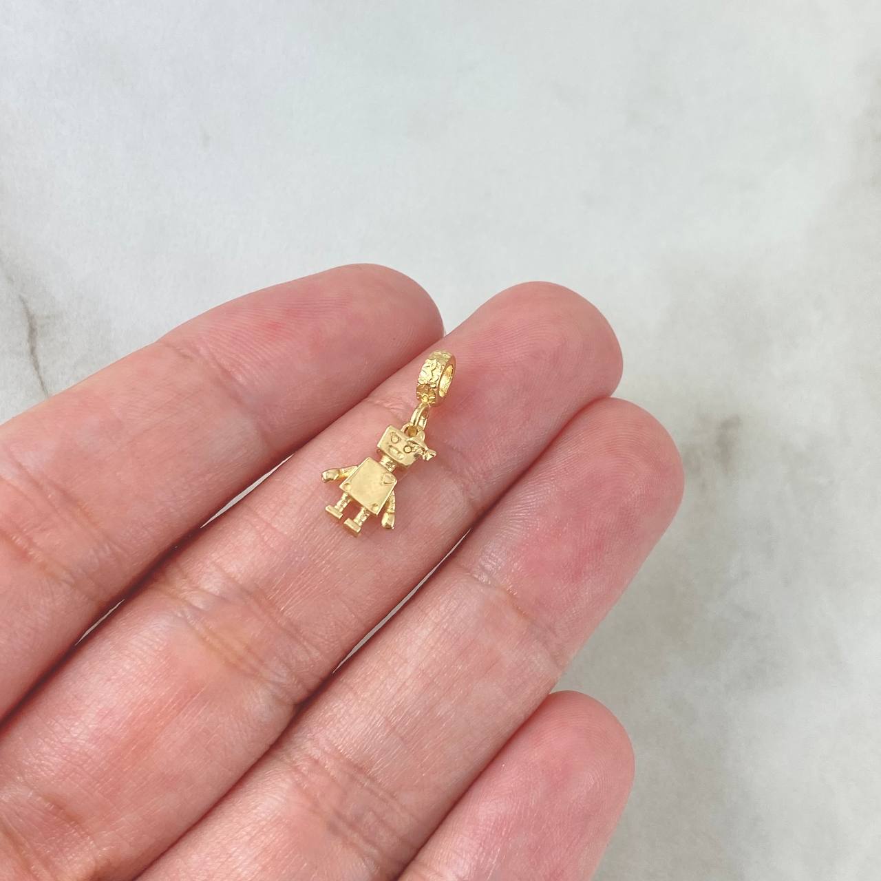 Dije Robot 1.1gr / 1.6cm / Oro Amarillo *