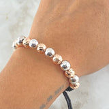 Pulsera Negra Bolas 5gr / 8mm Diamantadas 8und - Lisas 7und Dos Oros Blanco Rosa 18K *