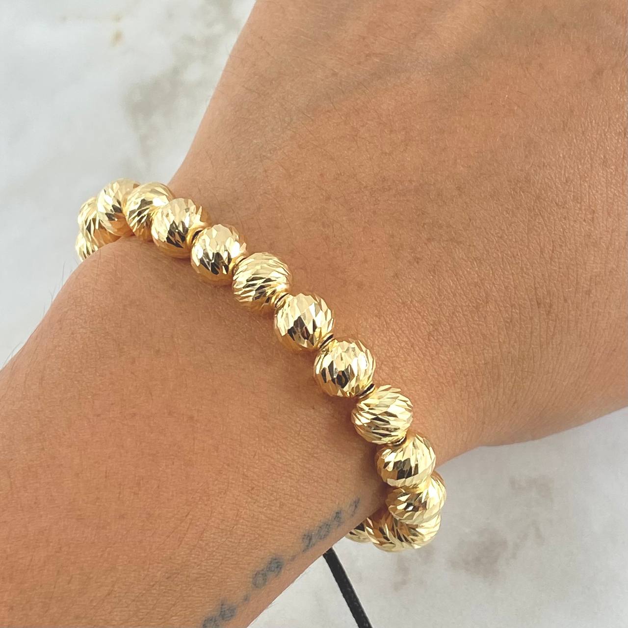 Pulsera Negra Bolas 4.15gr / 5mm Diamantadas 30und Oro Amarillo 18K *