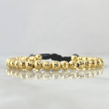 Pulsera Negra Bolas 4.15gr / 5mm Diamantadas 30und Oro Amarillo 18K *