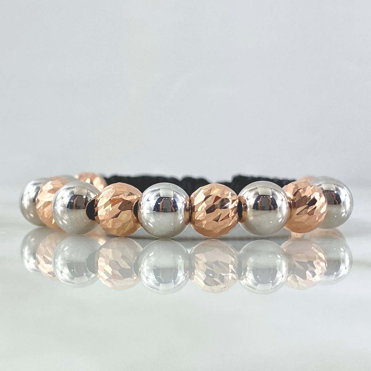 Pulsera Negra Bolas 5gr / 8mm Diamantadas 8und - Lisas 7und Dos Oros Blanco Rosa 18K *