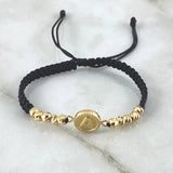 Pulsera Negra Herraje Letra A Circulo 1.8gr / 4mm Bolas Diamantadas 10 Und Oro Amarillo 18K