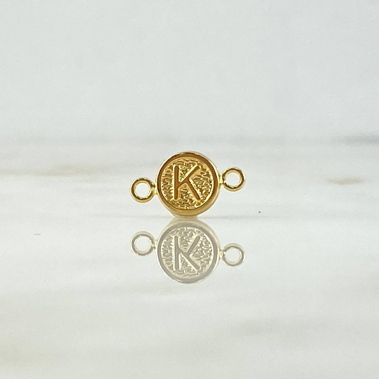 Herraje Letra K 0.35gr / 1.4cm / Circular Oro Amarillo