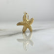 Dije Estrella De Mar 0.85gr / 2.4cm Troquelado Oro Amarillo