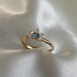 Anillo Flor 1.6gr-T5 3/4 Circones Celeste Blancos Oro Amarillo