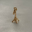 Dije Torre Eiffel 0.9gr/2.1cm Soplado Oro amarillo