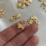 Dije Mariposa 0.5gr Oro Amarillo