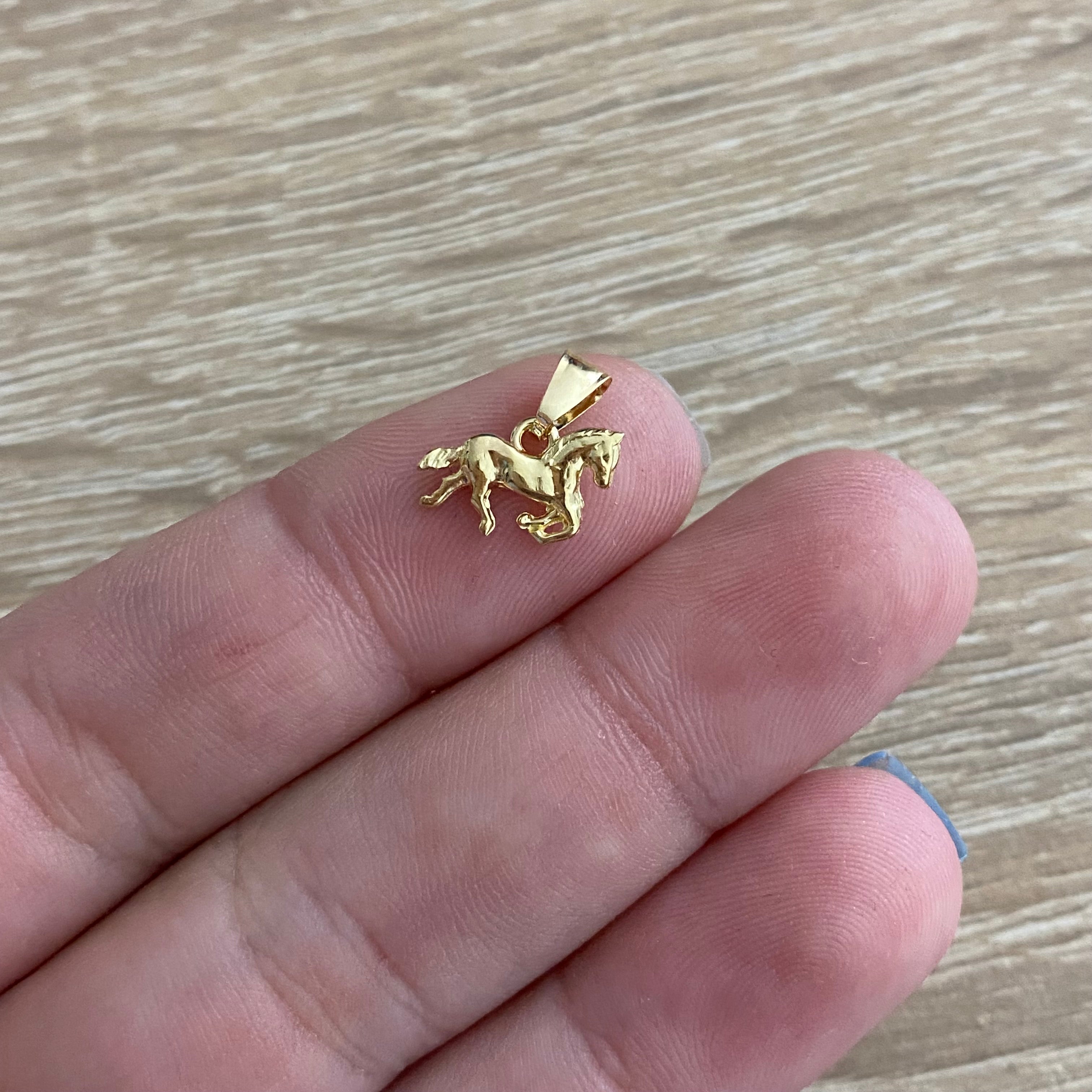 Dije Caballo 0.5gr/1.2cm Silueta Oro Amarillo