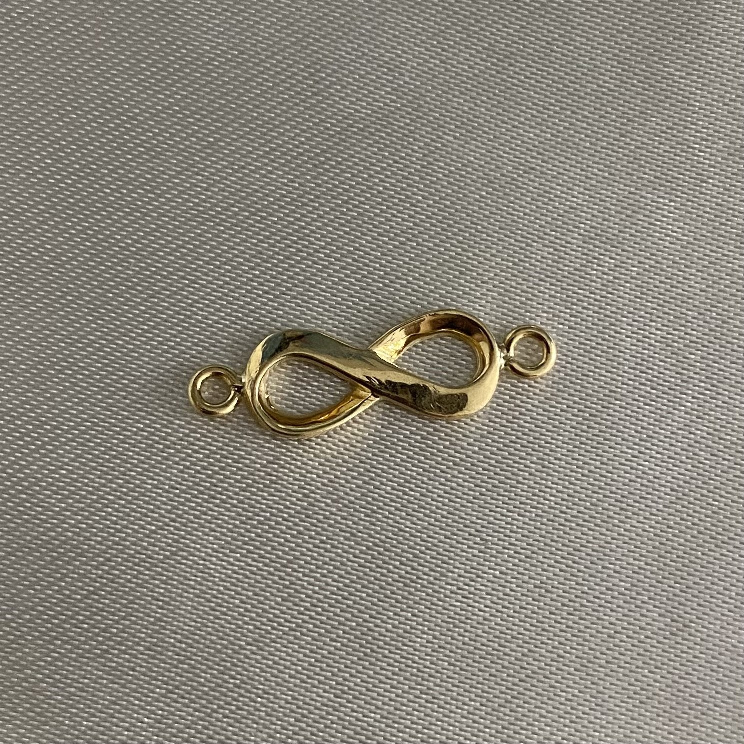 Herraje Infinito 1.25gr Oro Amarillo