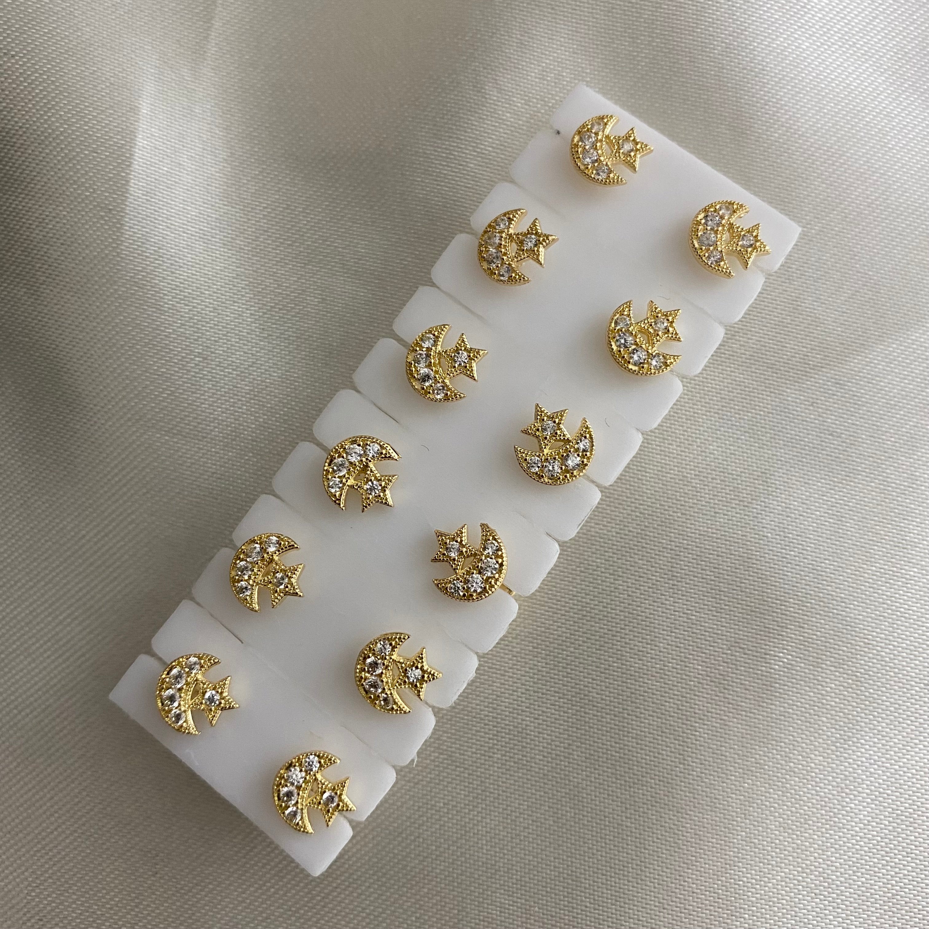 Topos Luna Estrella 1.05gr Oro Amarillo Circones Blancos