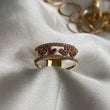 Anillo Corazones 2.8gr - T7 1/2 Oro Amarillo Circones Fucsia Blancos