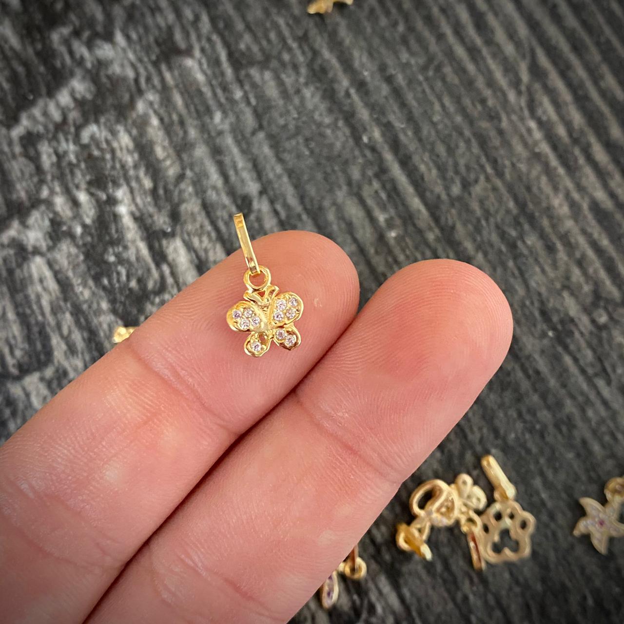 Dije Mariposa 0.45gr/1.4cm Tiny Circones Blancos Oro Amarillo*