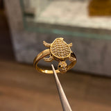 Anillo Tortuga 3.05gr-T6 Circones Blancos Negros Oro Amarillo