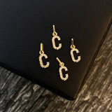 Dije Letra C 0.3gr/1.5cm Circones Blancos Oro Amarillo