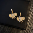 Dije Elefante 1.7gr/2.1cm Ojos Verdes Circones Blancos Oro Amarillo